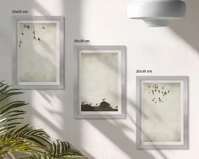 Bilderwand mit fliegender Vogelschar im minimalistischen Stil