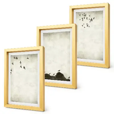 Bilderwand mit fliegender Vogelschar im minimalistischen Stil