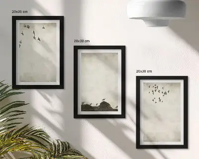 Bilderwand mit fliegender Vogelschar im minimalistischen Stil