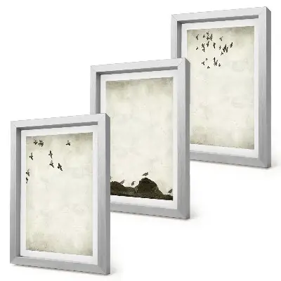 Bilderwand mit fliegender Vogelschar im minimalistischen Stil
