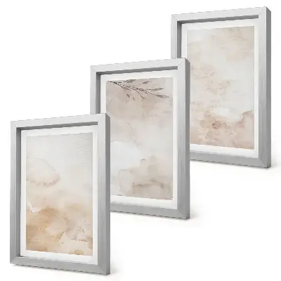 Bilderwand mit Aquarellflecken und Blättern in Pastellfarben