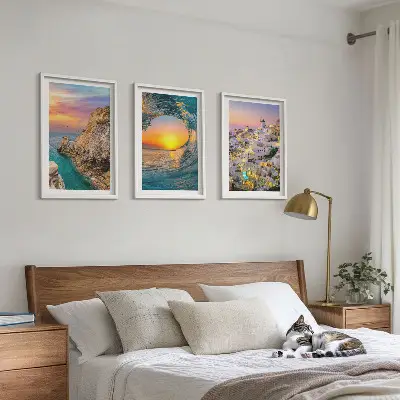 Bilder-3er-Set mit Rahmen Meereswellen und weiße Häuser auf Santorini