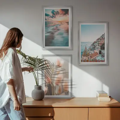 3er-Set Bilder mit Rahmen mit Motiven von Sonnenuntergang am Meer, Häusern sowie Blumen