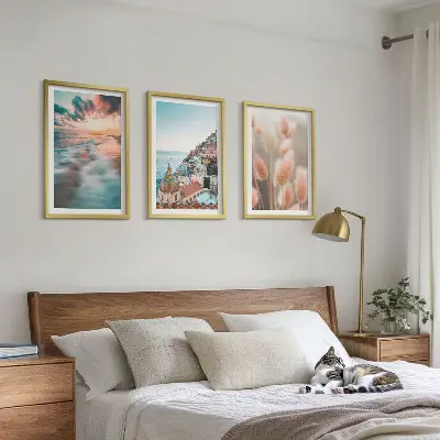 3er-Set Bilder mit Rahmen mit Motiven von Sonnenuntergang am Meer, Häusern sowie Blumen
