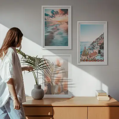 3er-Set Bilder mit Rahmen mit Motiven von Sonnenuntergang am Meer, Häusern sowie Blumen