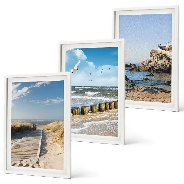 Gerahmtes Bilderset Strand mit Holzsteg und Klippen