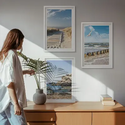 Gerahmtes Bilderset Strand mit Holzsteg und Klippen