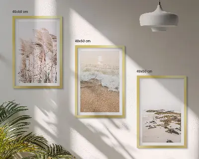 Gerahmtes Bilderset mit Strandgras, Wellen und Steinen im Boho-Stil