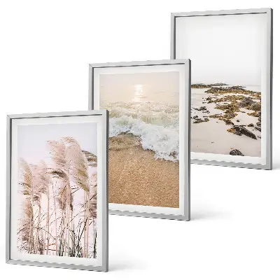 Gerahmtes Bilderset mit Strandgras, Wellen und Steinen im Boho-Stil