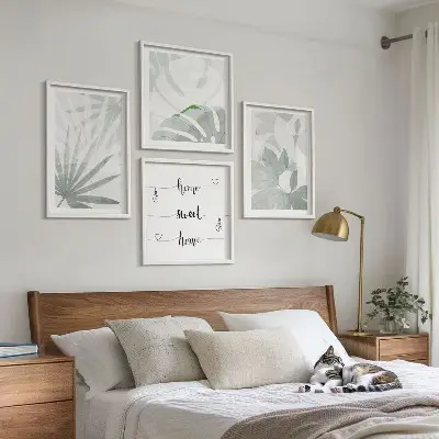 Wanddeko-Set mit grünlich-grauen Blättermotiven