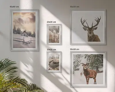 Modernes Wandbilder-Set mit verschneiten Winterlandschaften und Hirschen