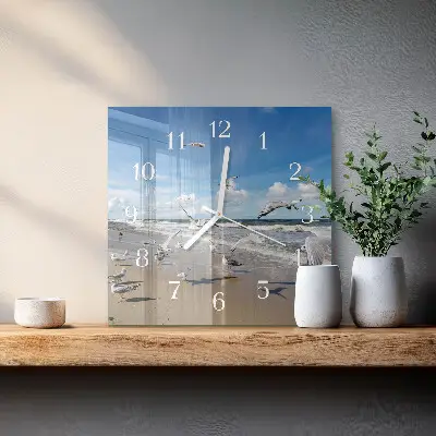 Quadratische wanduhr Möwen am Strand