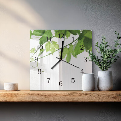 Quadratische wanduhr modern Blätter