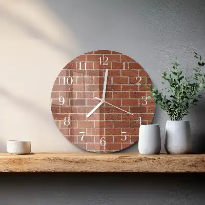 Runde wanduhr aus glas Ziegelmauer