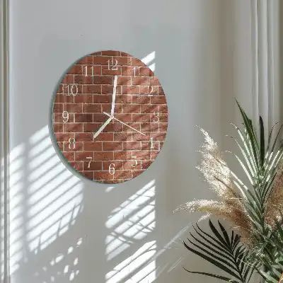 Runde wanduhr aus glas Ziegelmauer