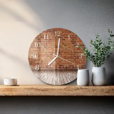Runde wanduhr aus glas Ziegelmauer