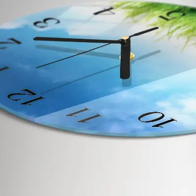 Runde wanduhr aus glas Gras
