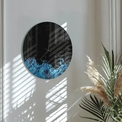 Runde wanduhr aus glas Wasser