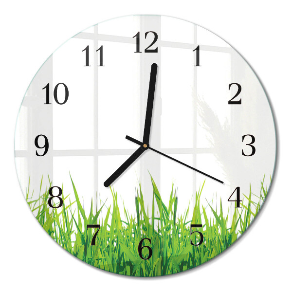 Runde wanduhr aus glas Gras