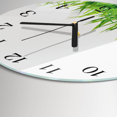 Runde wanduhr aus glas Gras
