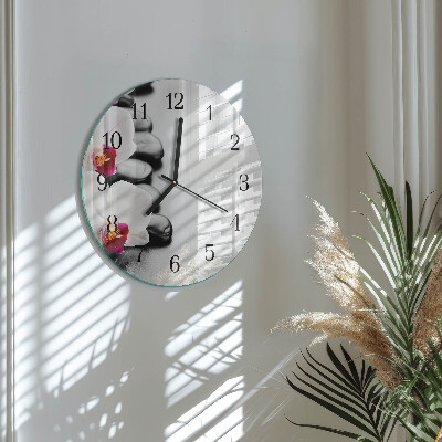 Runde wanduhr Steine ​​und Orchideen
