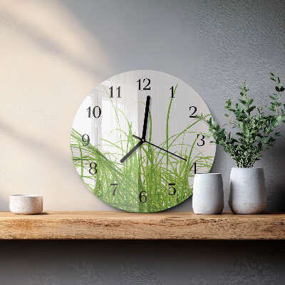 Runde wanduhr aus glas Gras