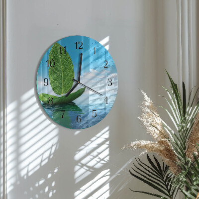 Runde wanduhr aus glas Blätter