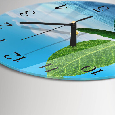 Runde wanduhr aus glas Blätter
