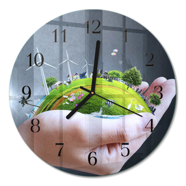 Glas wanduhr mit motiv rund Erde in der Hand