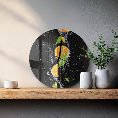 Runde wanduhr aus glas Orangen