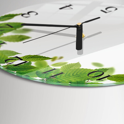 Runde wanduhr aus glas Blätter