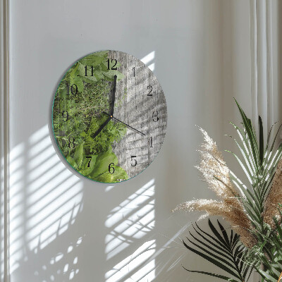 Runde wanduhr aus glas Kräuter