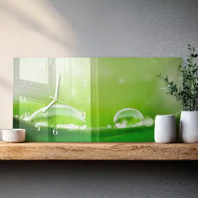 Horizontale glas wanduhr Tropfen auf einem Blatt