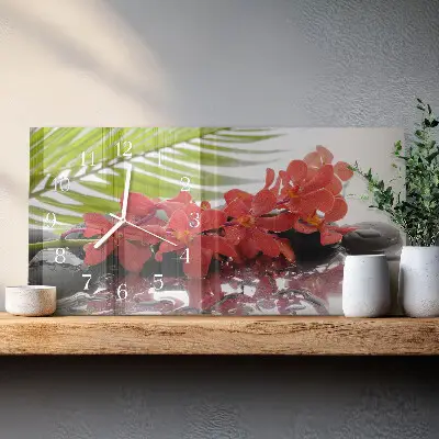 Horizontale glas wanduhr Blumensträuße und Steine