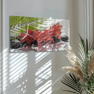 Horizontale glas wanduhr Blumensträuße und Steine